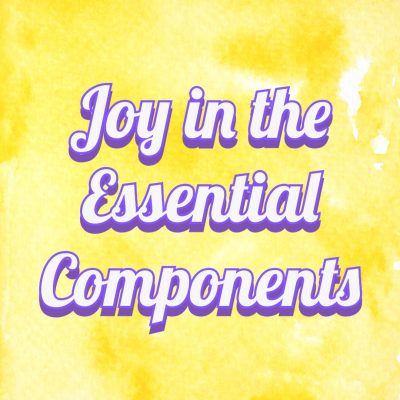 A yellow background with the words "Joy in the Essential Components" embossed in purple and white.